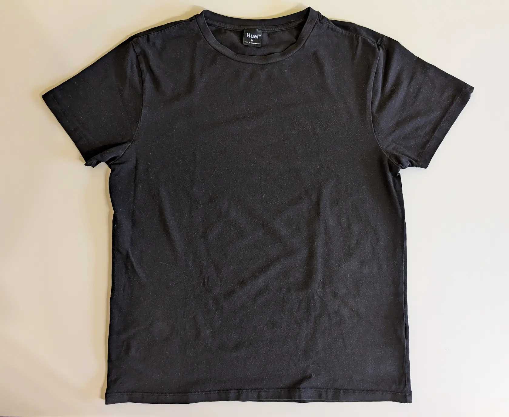 Huel T-Shirt after successful logo removal by peeling Huel T-Shirt after successful logo removal by peeling